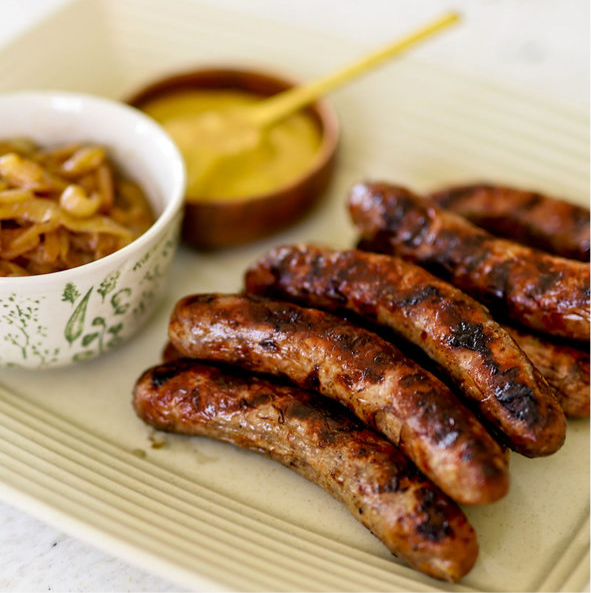 Beer Bratwurst with German Bacon Potato Salad and Seared Sauerkraut