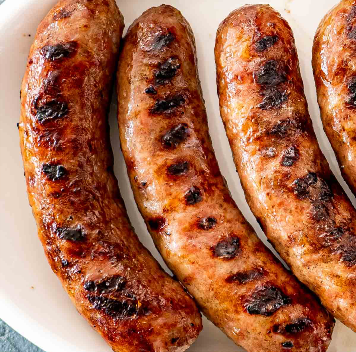 Beer Bratwurst with German Bacon Potato Salad and Seared Sauerkraut